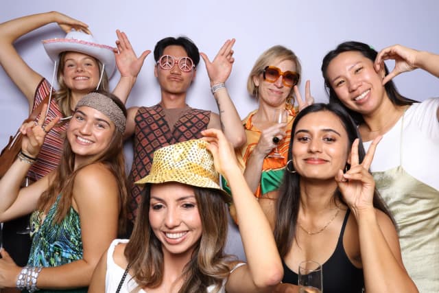 Guests enjoying a photo booth at a Melbourne celebration
